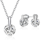 Designer 3 pc includes matching earrings, Pendant and NecklaceWhite gold rhodium platedChain included. Chain Length: Adjustable 16 - 18 inches long